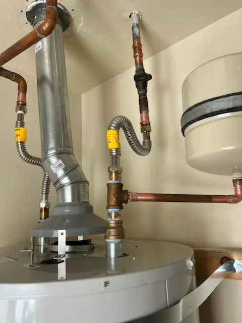 Water heater installation and plumbing repair in Pine Haven